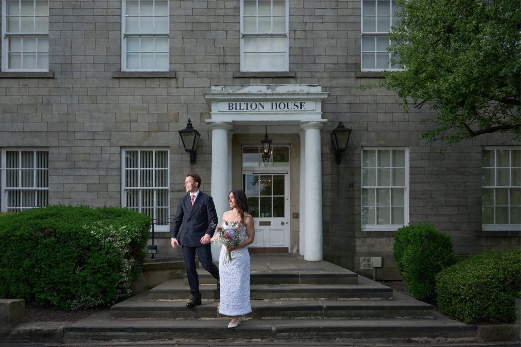 Bride and groom outside Harrogate Register Office by a wedding photographer